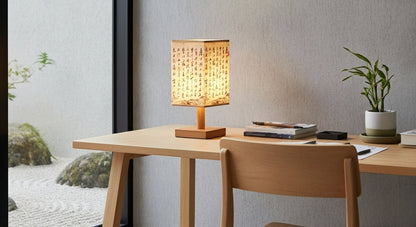 SereneScape 'Sakura Bloom' table lamp on a minimalist bedside table, casting a cozy, dimmable warm light in a modern bedroom. VelunaLumin.