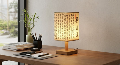 Close-up of the SereneScape Artisan Table Lamp's solid wood base and oriental art linen shade, showcasing its handcrafted quality. VelunaLumin.