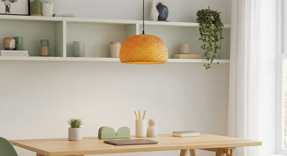 A ZenWeave 'Harmony Dome' bamboo pendant light centered over a clean home office desk, offering a calm, diffused light ideal for a productive Zen-like workspace. VelunaLumin.
