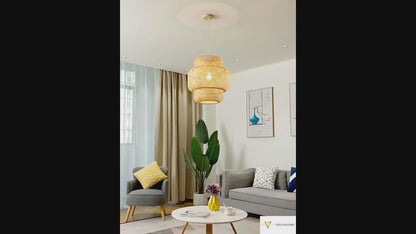 Three ZenWeave 'Tiered Serenity' bamboo pendants hanging over a modern sushi bar, casting a warm, inviting light and creating an authentic, serene oriental atmosphere. VelunaLumin.
