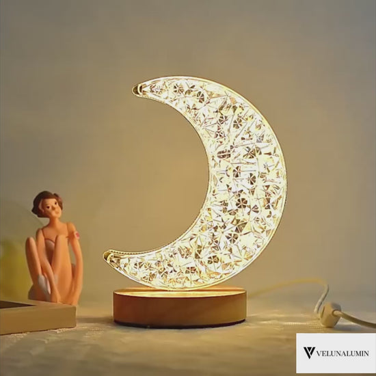LunaSphere 3D moon crystal lamp with touch dimming.