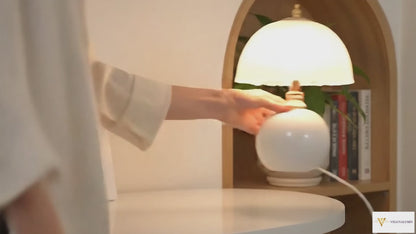 NouveauGlow Murano-Style Mushroom Lamp in Classic White, Pink and Creme, with a hand-blown striped glass shade and ceramic base. VelunaLumin.